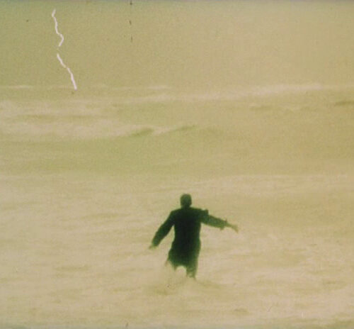 Miguel man walking into ocean